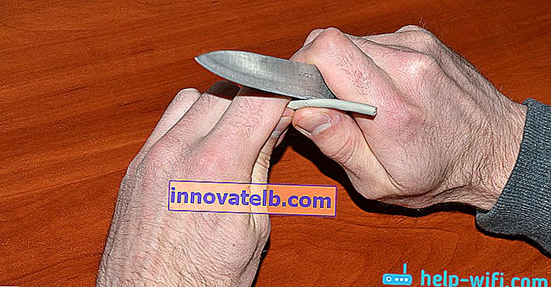 Ein Twisted-Pair-Kabel mit einem Messer abisolieren