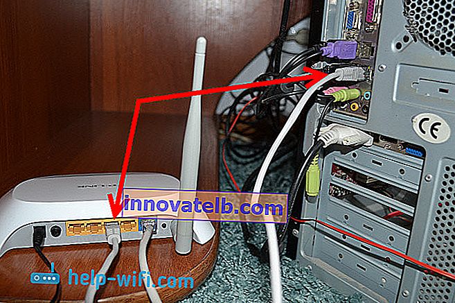 Foto: Anschließen eines Computers an einen Router über ein Netzwerkkabel